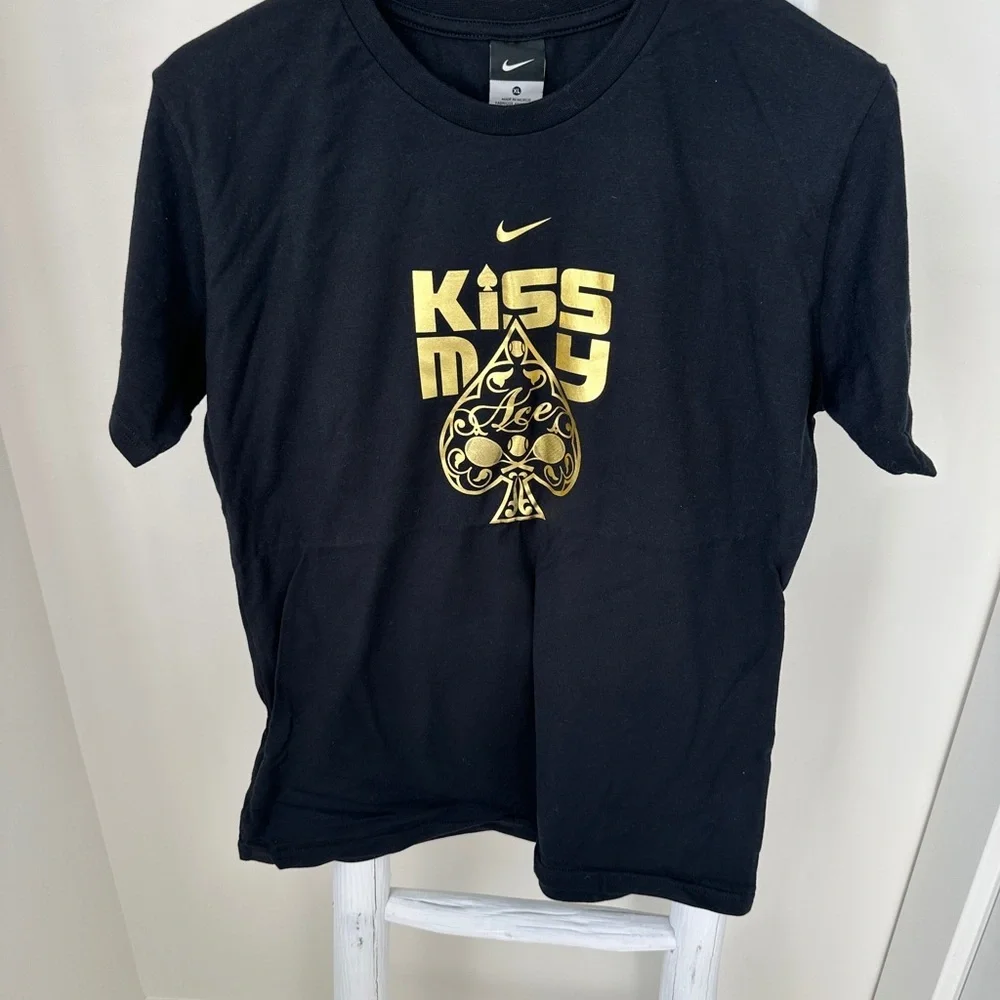 Nike Tennis Black and Gold Graphic Tee with Gold Kiss My Ace NYC10 Collection
